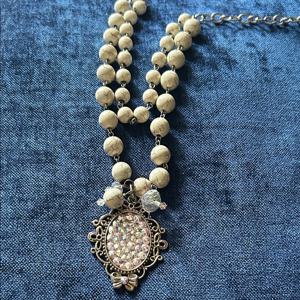 Elegant Beaded Necklace with Crystal Pendant